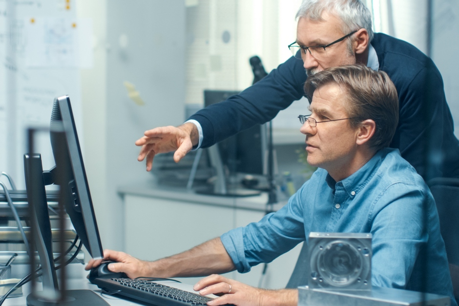 Man giving constructive criticism at work